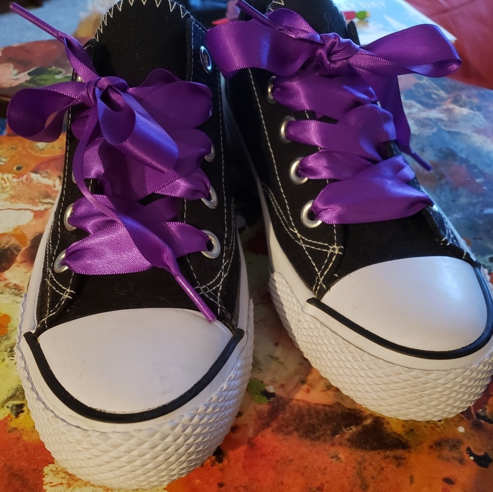 Black and white Airwalks with ribbon shoe laces